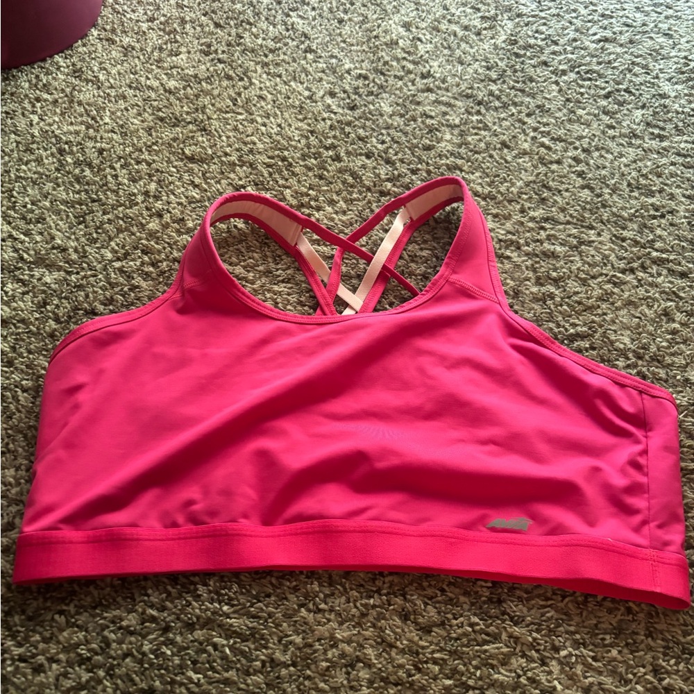 Avia Hot Pink Sports Bra never worn has a stain on side as shown in image